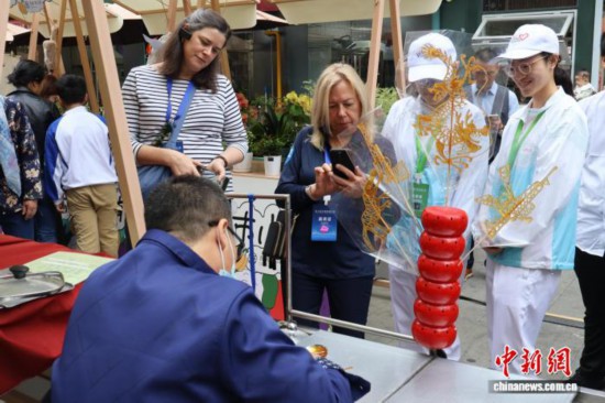 第七届中美友城大会嘉宾感受杭州“烟火气”华体会- 华体会体育官网- 体育APP下载